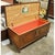 Crafted from cedar with a warm medium-tone finish, this piece features an ornate front panel with carved detailing,...