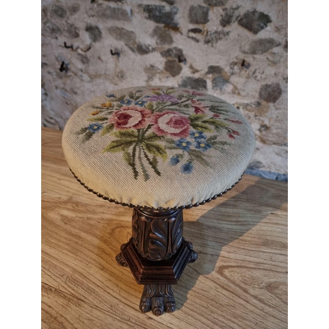 This antique height-adjustable piano stool dates from the late 19th to early 20th century and is crafted from solid wood....