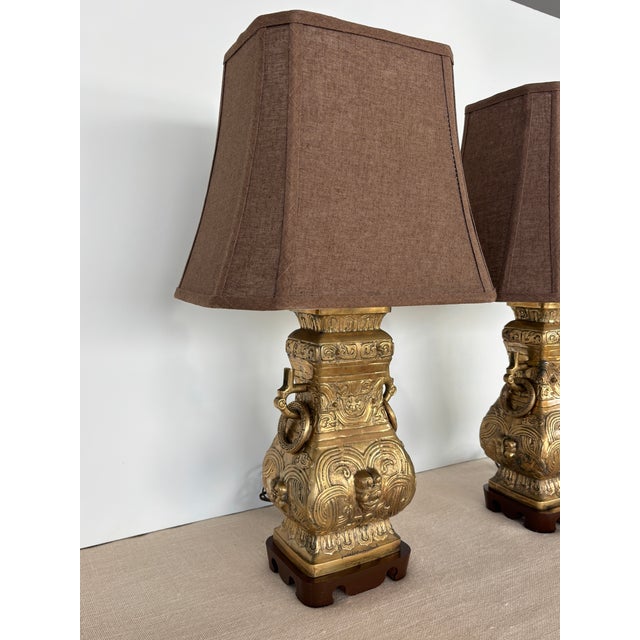 Vintage Pair Asian Archaic Brass Urn Lamps James Mont Style With Linen Shades For Sale - Image 4 of 15