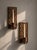 Pair of french brutalist wall sconces, circa 1970s, crafted in solid oak with carved geometric decoration and removable...