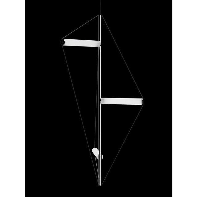 Ceiling lamp with chrome structure and frosted light tubes kept together by three elastic wires. European Plug (up to 250V).