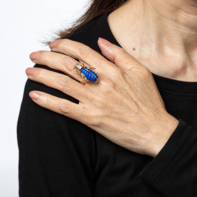Distinct and unique vintage insect ring crafted in 14 karat yellow gold (circa 1970s). Diamonds total an estimated 0.02...