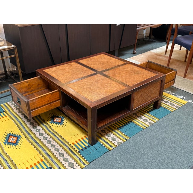 Design Plus Gallery presents a Vintage Chinese-Style Woven Rattan Four-Drawer Coffee Table. This square cocktail table...