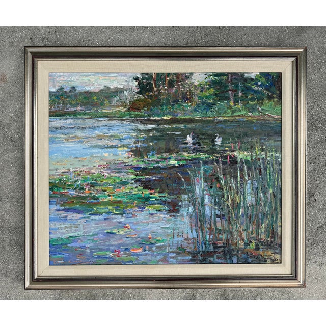 Original oil on canvas landscape painting attributed to Lau Chun, depicting a tranquil water lily pond rendered in the...