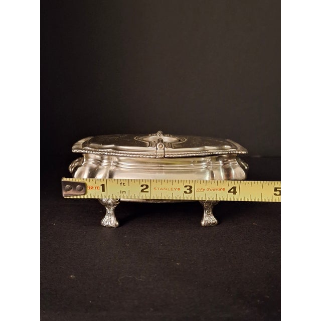 Up for sale is a finely detailed vintage silver-plated Havdalah Compendium, cleverly combining a central Havdalah candle...