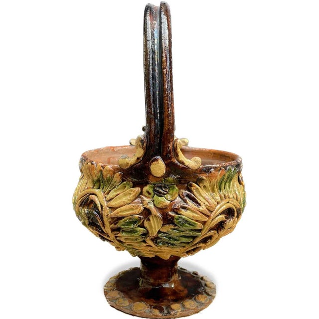 Val di Chiana Ceramic Brazier with Handle, 1800s. Antique Tuscan ceramic warmer with a brown background featuring small...