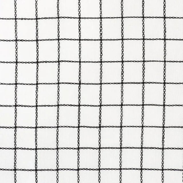 Beautiful and delicate, Agnes Sheer features a chainstitched window pane on a pure linen ground. This small-scale...