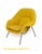 A warm, sculptural portrait of an Eero Saarinen Womb Chair. Photographed by Christopher Dibble, this contemporary still-...