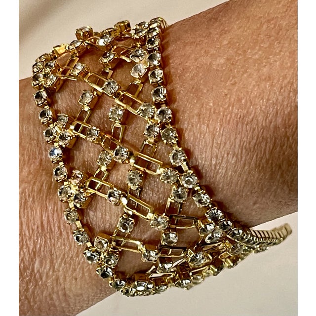 Sparkly, colorful crystal bracelet by AFJ. Gold plated lattice bracelet, embellished with super sparkly faceted glass...