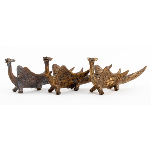 Louis Mendez (American, 1929-2012) Group of Three Gilt Bronze Dragon Sculptures.&nbsp; Each: 3" H x 7" W x 1.5" D....
