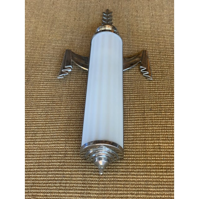 This fabulous pair of large Art Deco wall sconces remind me of the beautiful Chrysler Building in NYC. These sconces are...