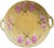 An antique German majolica serving platter by GS Zell, featuring raised pink carnations against a richly textured honey-...
