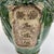 Very usual wine jug with a green and brown glaze. The front panel with Chinese writing indicates a type of wine. Each...