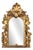 Baroque Mirror in Carved and Gilded Wood For Sale