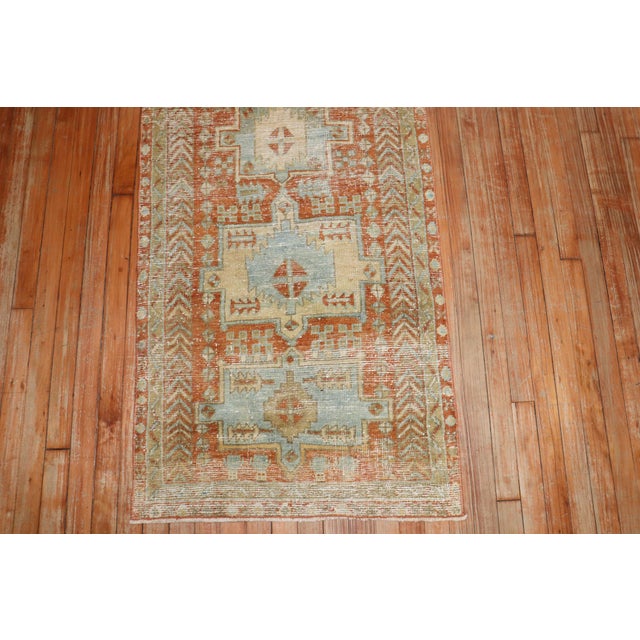 an early 20th century worn persian heriz runner Measure: 2'7'' x 8'2''.