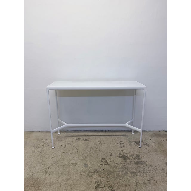 1966 Collection high top outdoor bar table with white porcelain top and weather-resistant polyester powder coat finish on...