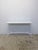 1966 Collection high top outdoor bar table with white porcelain top and weather-resistant polyester powder coat finish on...