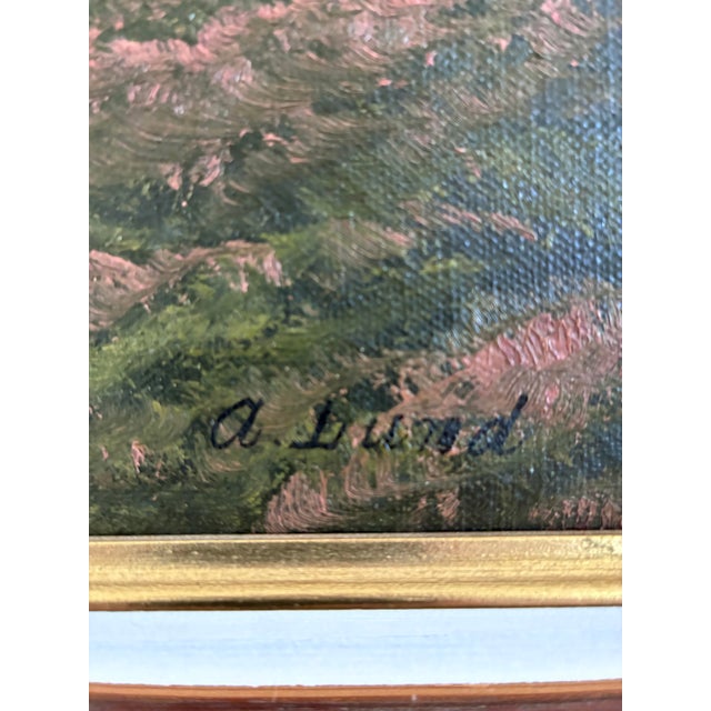 This antique original landscape oil painting, from around the 1920s, shows a country landscape with rolling hills, a...