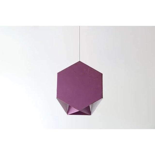 Unique and exclusive geometric pendant lamp designed by Ole Panton for Lyfa. This original purple lacquered lamp was...