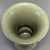 Fine antique Chinese celadon gu‑form beaker vase. Flaring wide rim with vertical raised flanges, segmented bulbous body,...