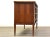 A mid century modern walnut six drawer dresser by Kent Coffey Simplicité with sculpted drawer pulls and dovetail...