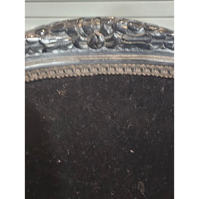 Description: Set of 3 bar stools or kitchen stools featuring Ebonized black frames upholstered in a black faux suede...