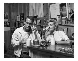 Paul Newman and Joanne Woodward 1958 (Photo by Sid Avery)