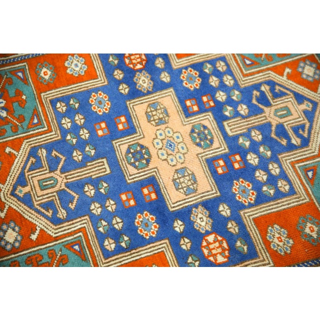 Introducing a one-of-a-kind vintage Turkish hand-knotted wool rug, carefully crafted by skilled artisans using traditional...