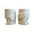 A striking pair of vintage studio pottery mugs distinguished by their sculptural, hand-formed silhouettes and soft...