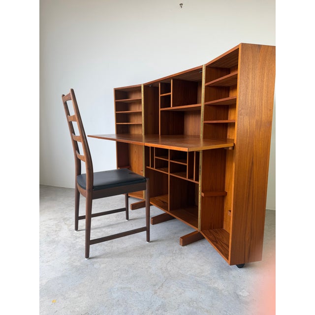A brilliant example of Scandinavian space-saving design, this authentic Mid-Century Danish Modern “Magic Box” desk was...