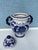 Ceramic Ginger Jar. Lidded Blue and White Jar. Features 2 Large handles. Measures 13" tall .