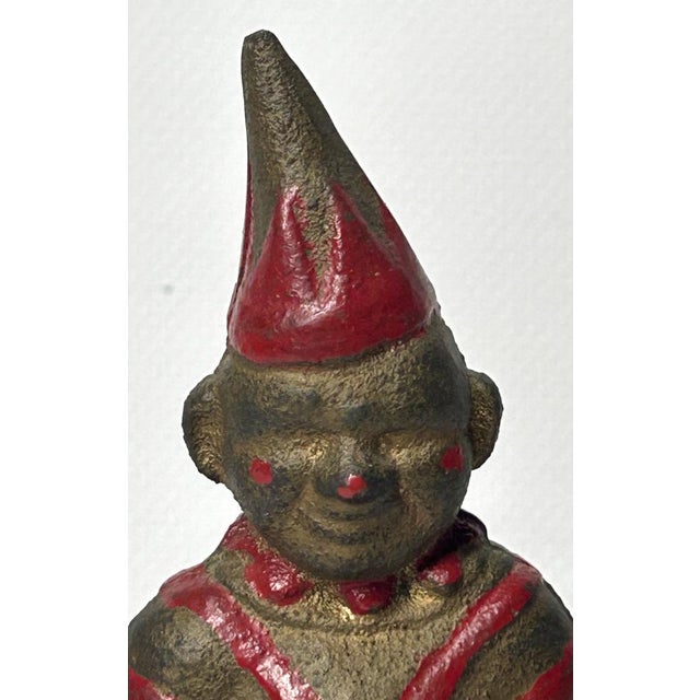 Antique Cast Iron Money Box by AC Williams, England, 1908 Penny Still Bank Jester Inspired by the British puppet show...