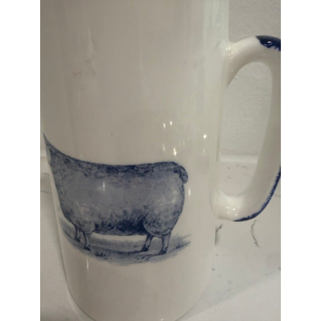 English Vintage White Jug / Pitcher With a Sheep on Both Sides With Blue Trim From England For Sale - Image 3 of 8