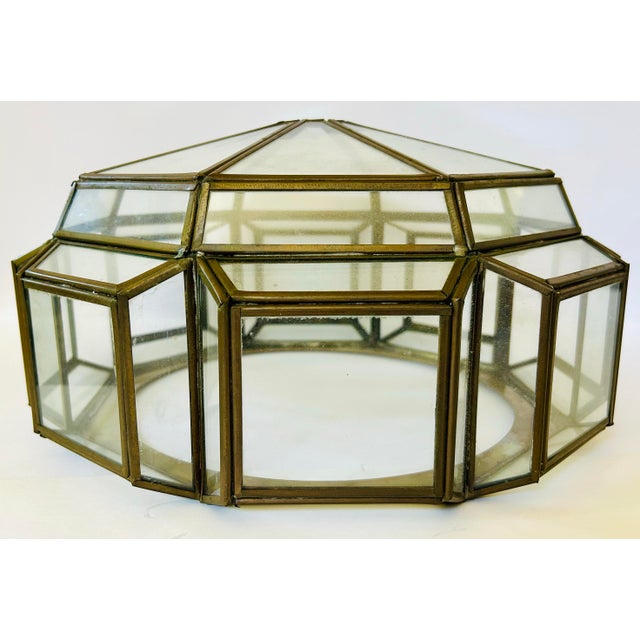 Vintage brass-framed octagonal flush mount light shade with clear glass panels. Measures 10.5” with a 9.25” opening. 1.25”...