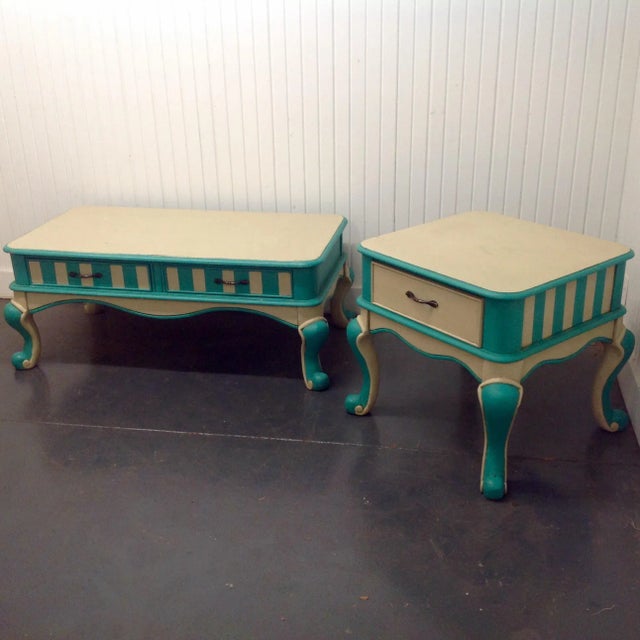 Here is a pair of Mid-Century era side tables. Includes one cocktail table and one side table. These feature a fabulous...