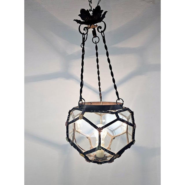 An Italian special kind of hand made pendant in a renaissance revival style. The materials used are iron, glass and...