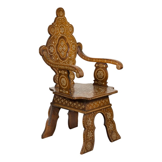 Moroccan Richly Inlaid Armchair with Carved Back and Scrolling Arms, circa 1900 For Sale