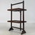A charming and unusual early 20th-century English Edwardian folding tray stand, finely crafted from oak and combining...