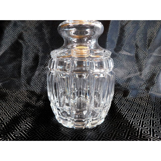 This is a very pretty, very clean, cut crystal decanter that has sticker that states it is over 24% lead crystal and hand...