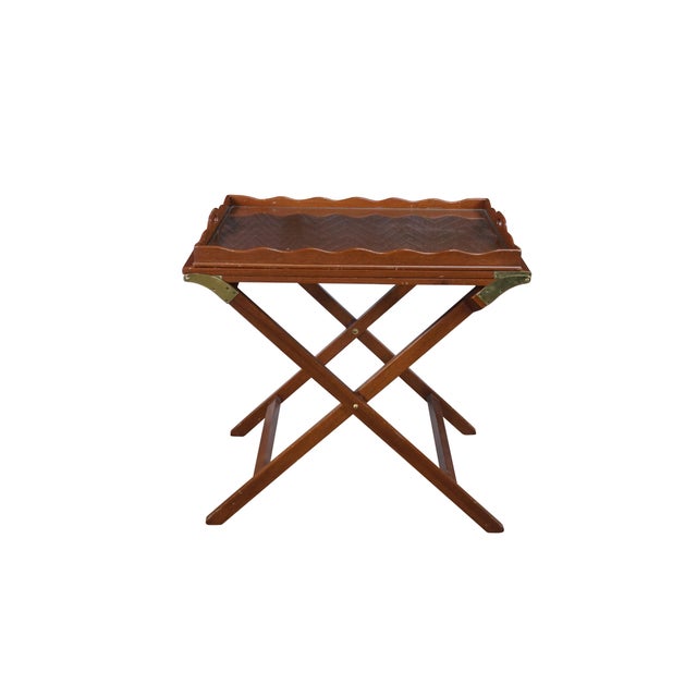 This mid-century Baker Furniture "Party Butler" Expandable Serving Table features a highly functional, campaign style...
