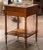 A refined example of a traditional French rafraîchissoir, this antique walnut table was designed as a convenient serving...