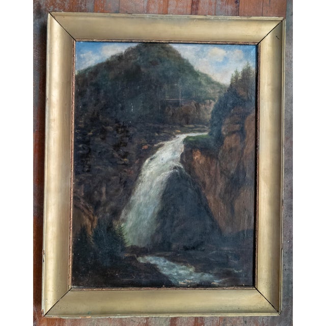 We are offering this 19th Century German landscape painting of a waterfall. This painting features an alpine scene with...