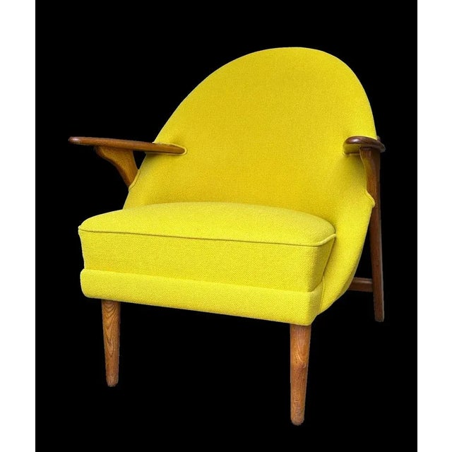This is a very scarce original 'wingman' armchair byArne Hovmand Olsen. Frame is in very nice condition and upholstery has...