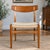 Overview A beautiful Hans J. Wegner CH23 Danish Modern dining chair, manufactured by Carl Hansen & Son and featuring the...