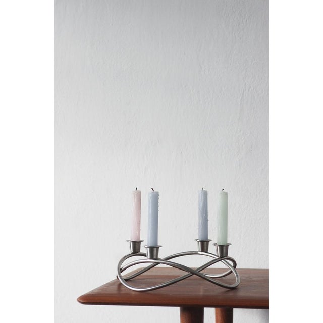 A candleholder season with a modern and decorative expression Which represents the simplicity of Danish design. This was...
