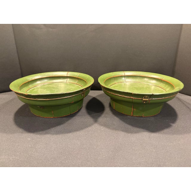 These bowls are versatile and create a uniquely Asian look in any space. The twisted metal rope and brackets “holding...