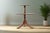 2-tier mahogany tripod side table with original leather top and nicely turned center column. Condition: Good, wear...