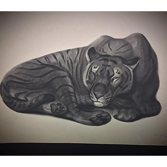 This stunning 1930 Art Deco engraving by acclaimed French artist George Lucien Guyot features a majestic tiger in...