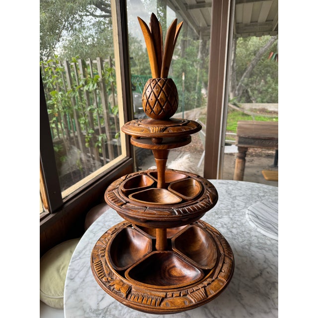 Vintage hand-carved, three-tiered monkey pod wood lazy Susan serving tray. This stunning pedestal stand centerpiece...