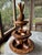 Vintage hand-carved, three-tiered monkey pod wood lazy Susan serving tray. This stunning pedestal stand centerpiece...